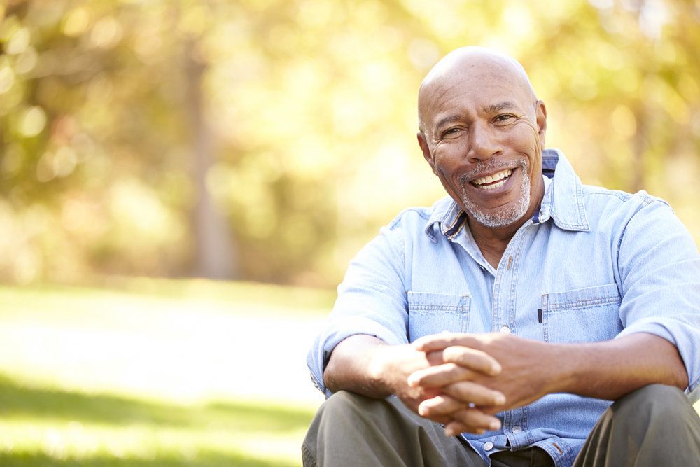 man with a bright white, healthy looking smile