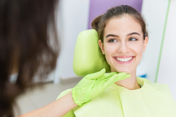 Smiling woman at dental exam
