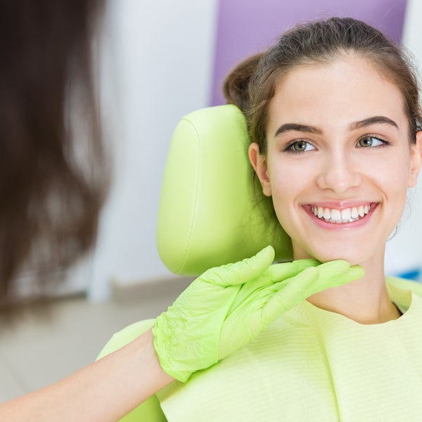 Smiling woman at dental exam