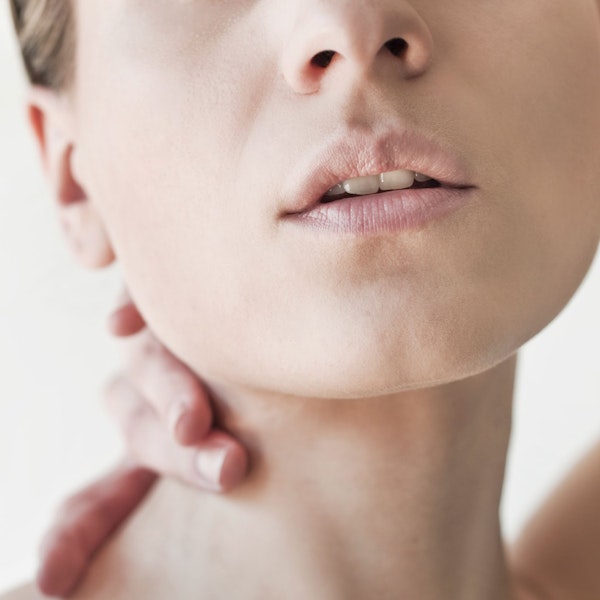 woman showing chin and lower face 