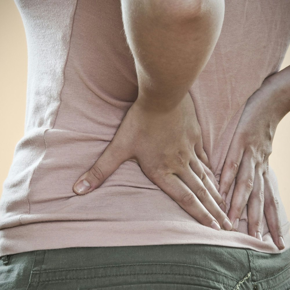 Lumbar spine region pain