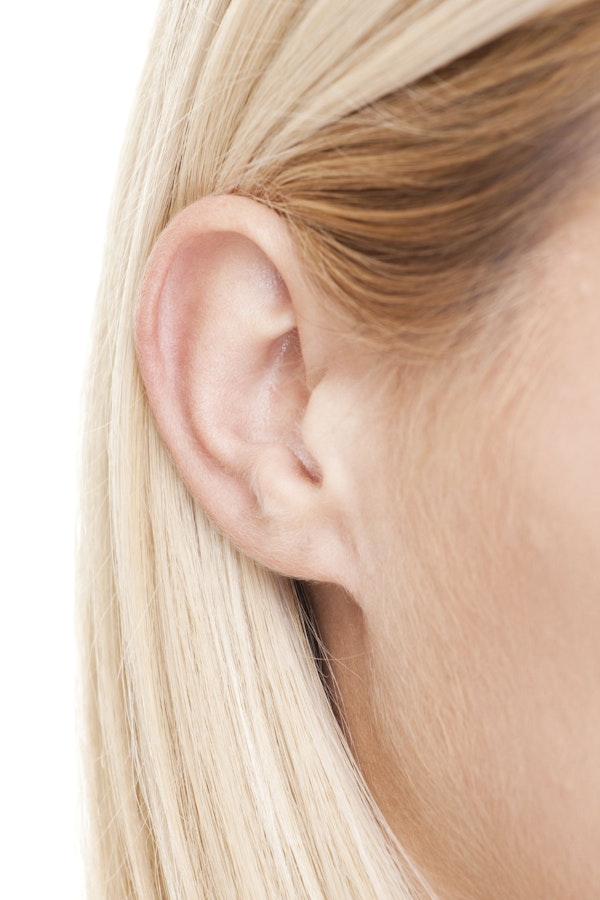 close-ip of woman's ear