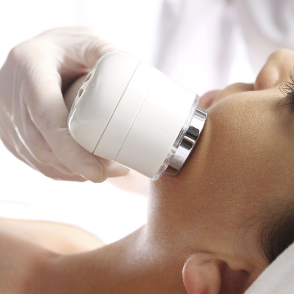 woman receiving microdermabrasion