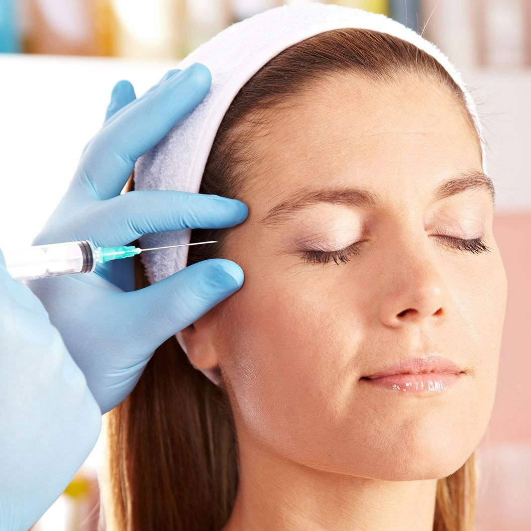 Woman receiving BOTOX injection