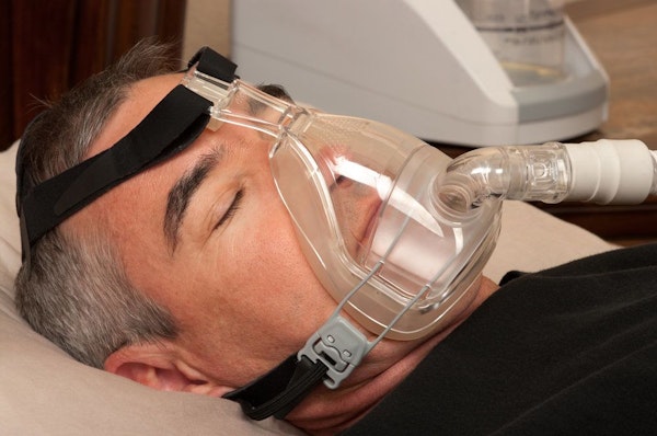 Man wearing CPAP mask