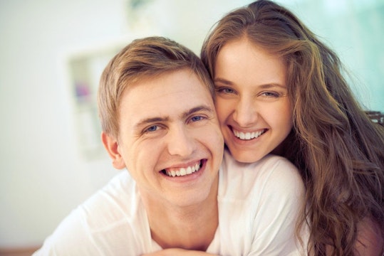 Smiling young couple indoors