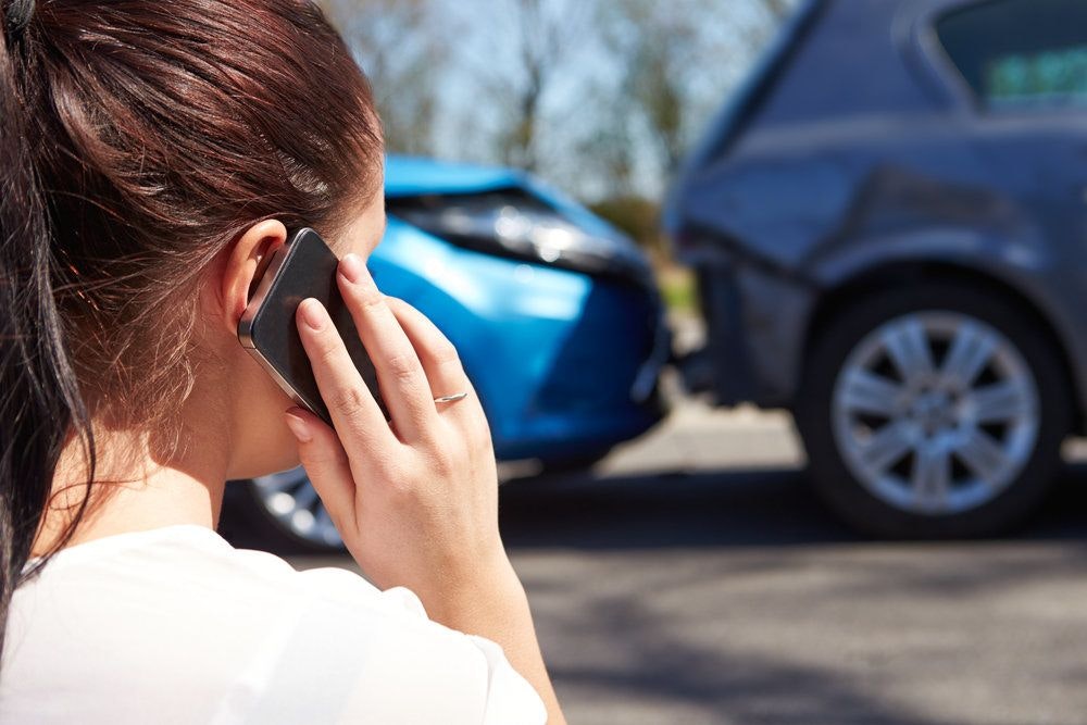 Car accident victim calling insurance