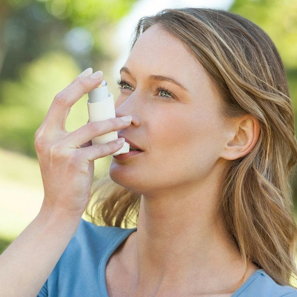 Woman with inhaler