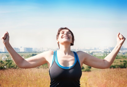 A woman showing off her upper arms