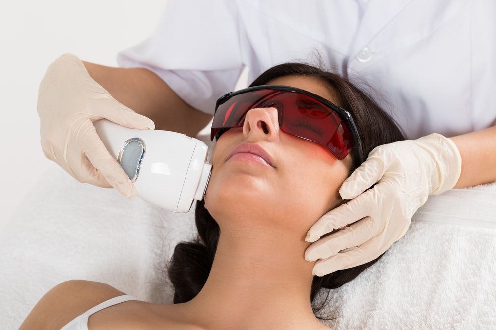 Woman receiving laser treatment