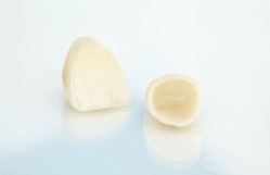 Dental crowns on a light background