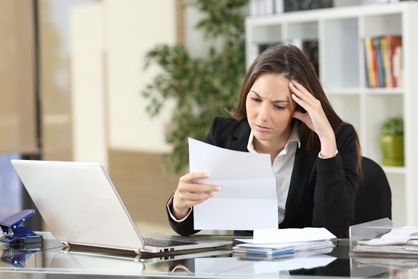Young woman looking at finances