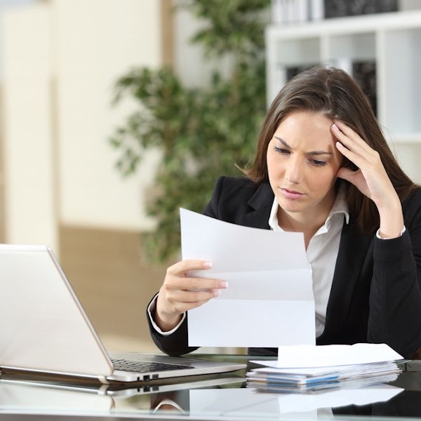 Young woman looking at finances
