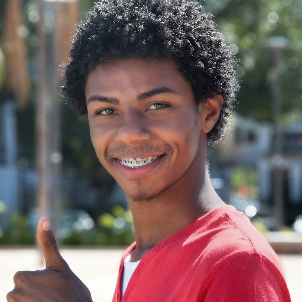 Man with traditional braces