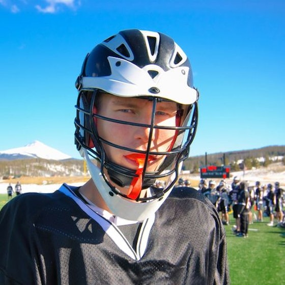 Male lacrosse player with a mouth guard