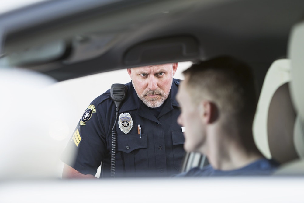 Cop stopping a driver