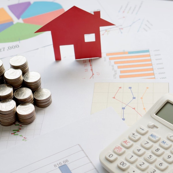 Property division paperwork with stack of coins