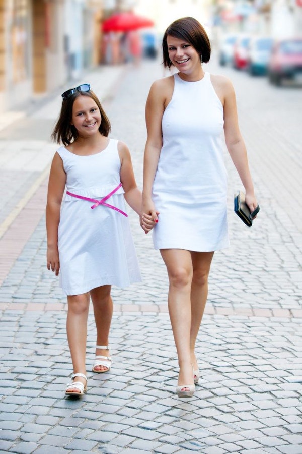 woman and a child near pool