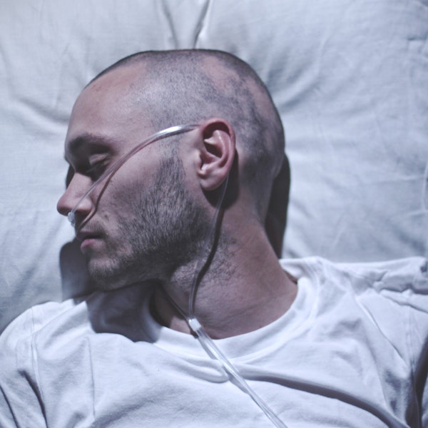 Man in hospital bed