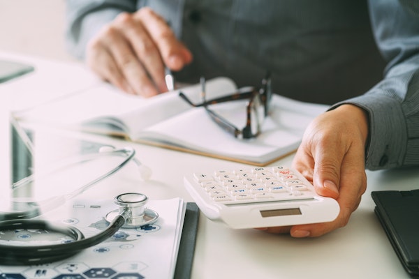 Person using calculator