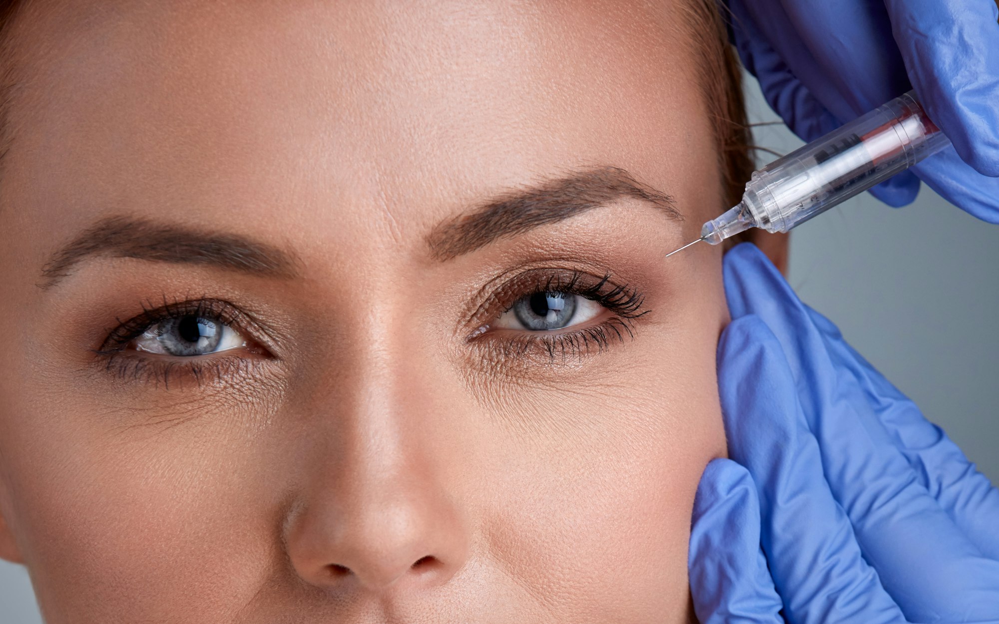 Woman receives cosmetic injections