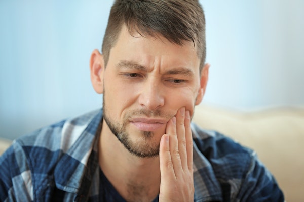 Man with jaw pain