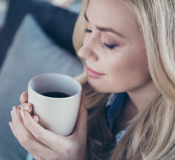 Lady relaxing with coffee