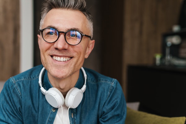Mature man with glasses smiling