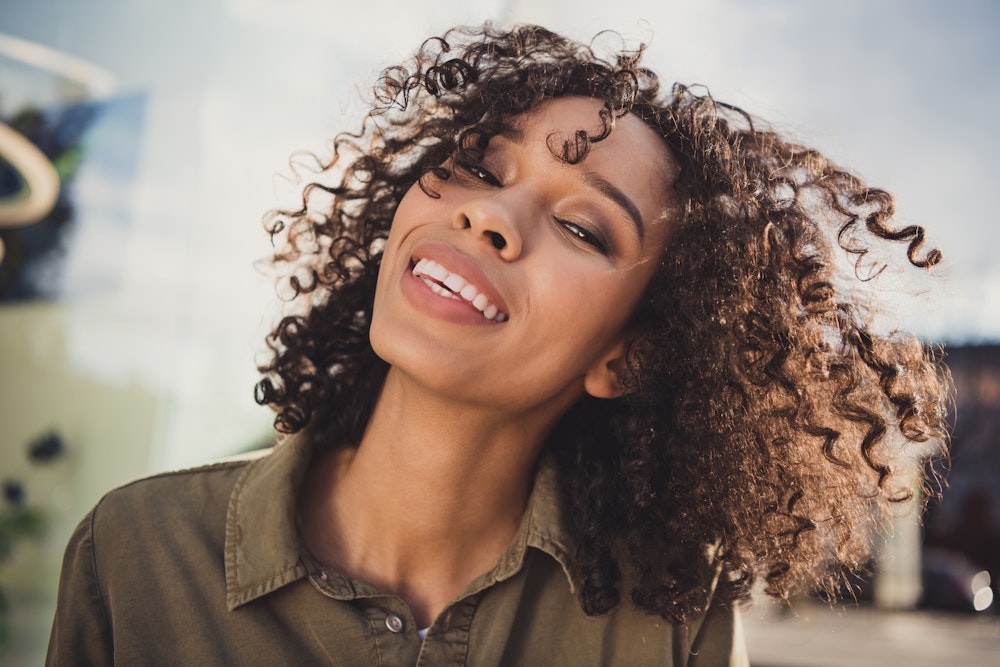 Beautiful woman smiling outdoors