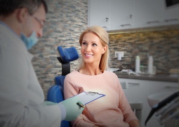 Dentist with a patient