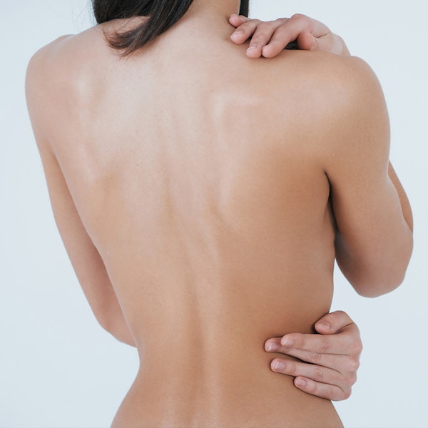 Woman's slim back after an upper body lift