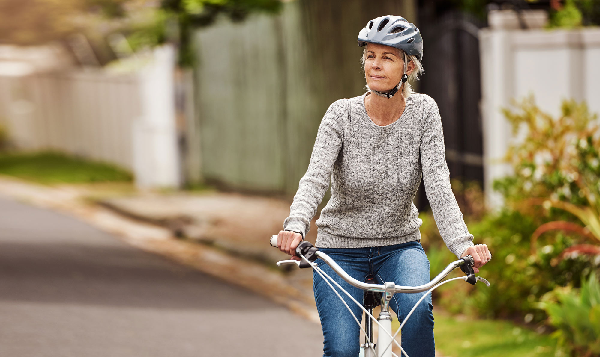 Mature woman biking