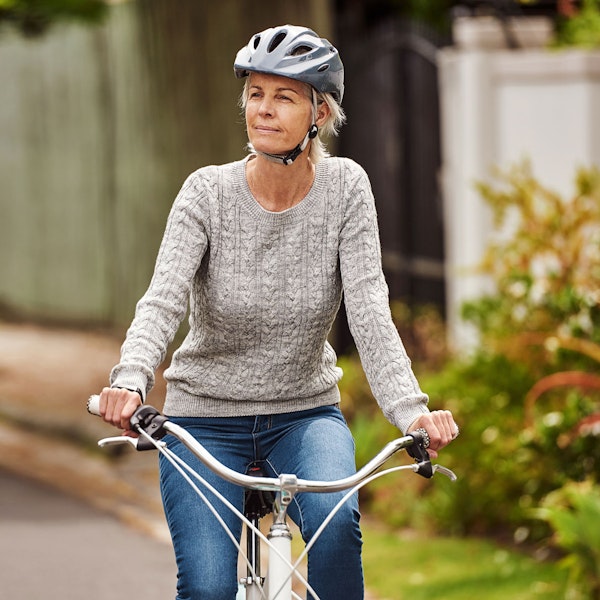 Mature woman biking