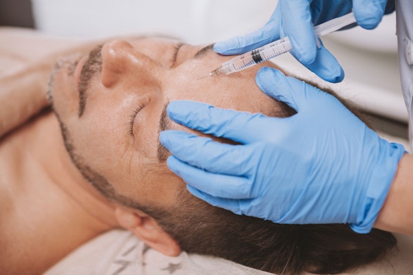 Man receiving injection