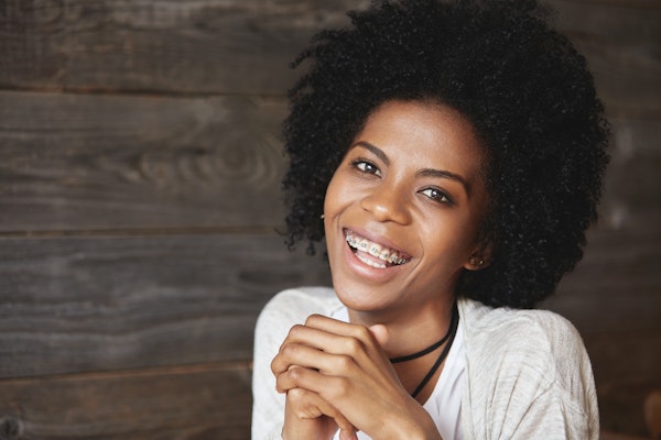 Smiling woman with braces