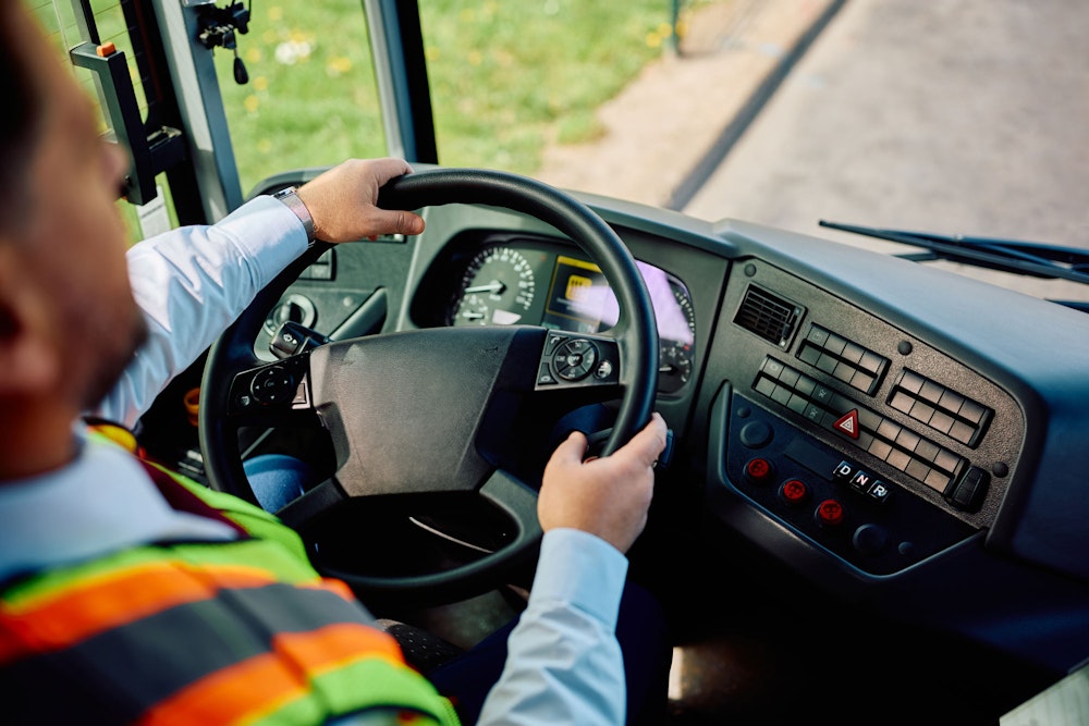 Bus driver driving