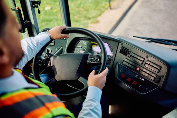 Bus driver driving