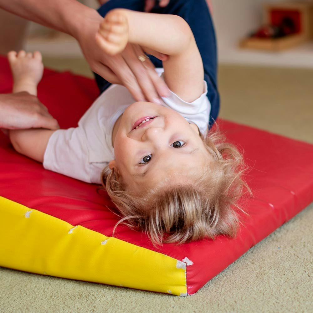 Baby with Cerebral Palsy playing with parent