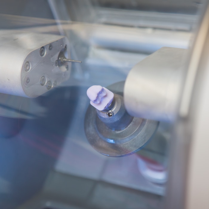 Crown being made in CEREC machine