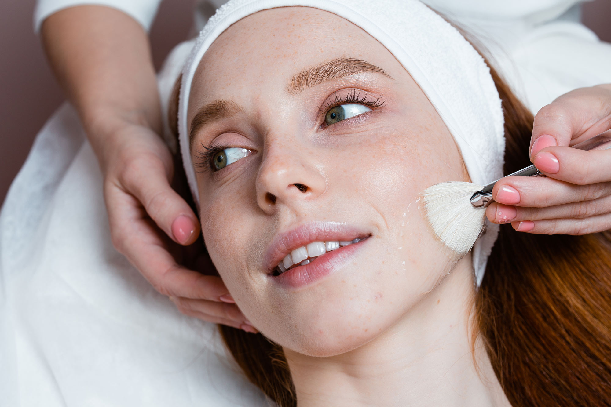 Woman getting chemical peel