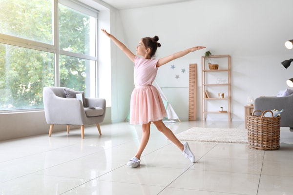 Young dancer in her house