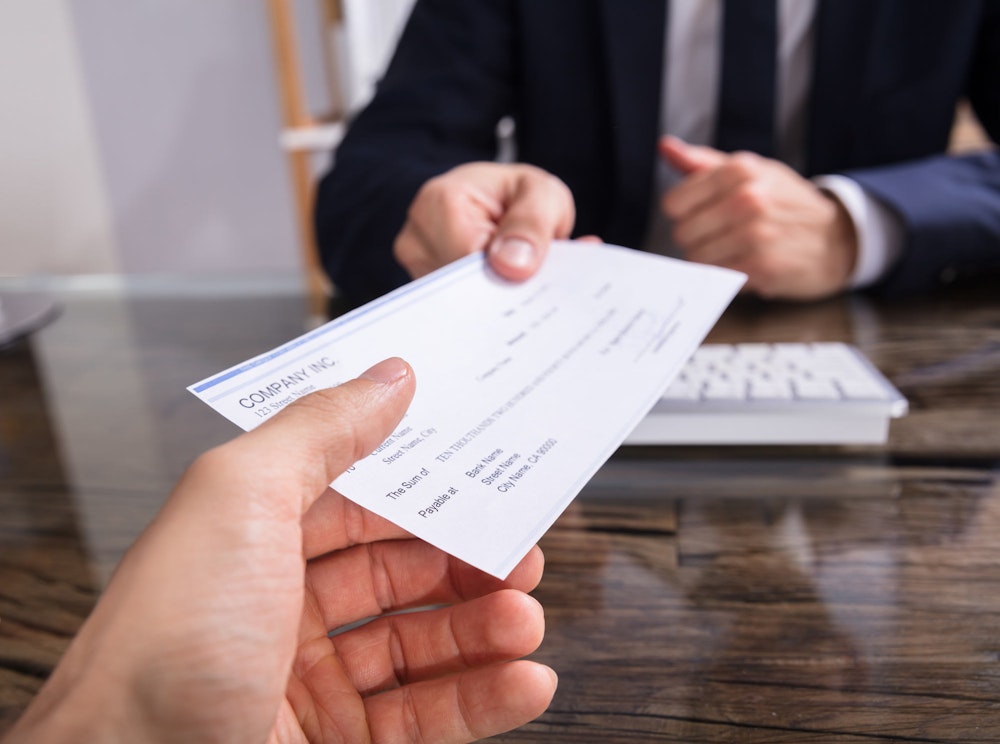 Person receiving a check