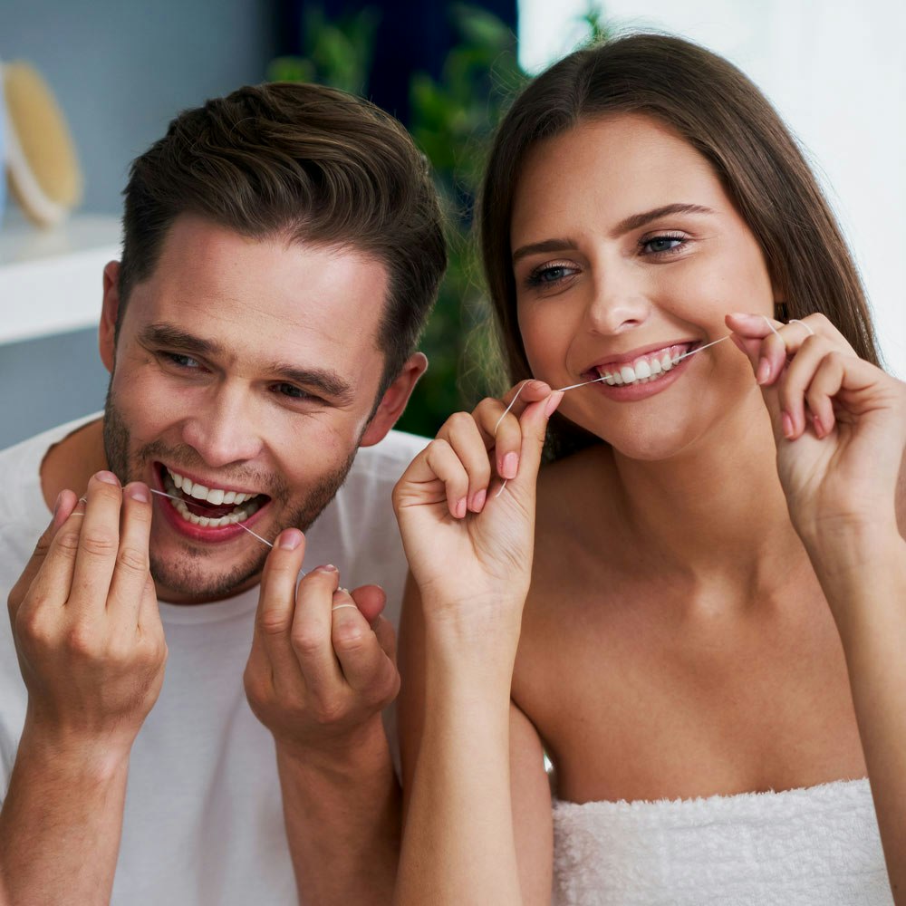 Couple flossing