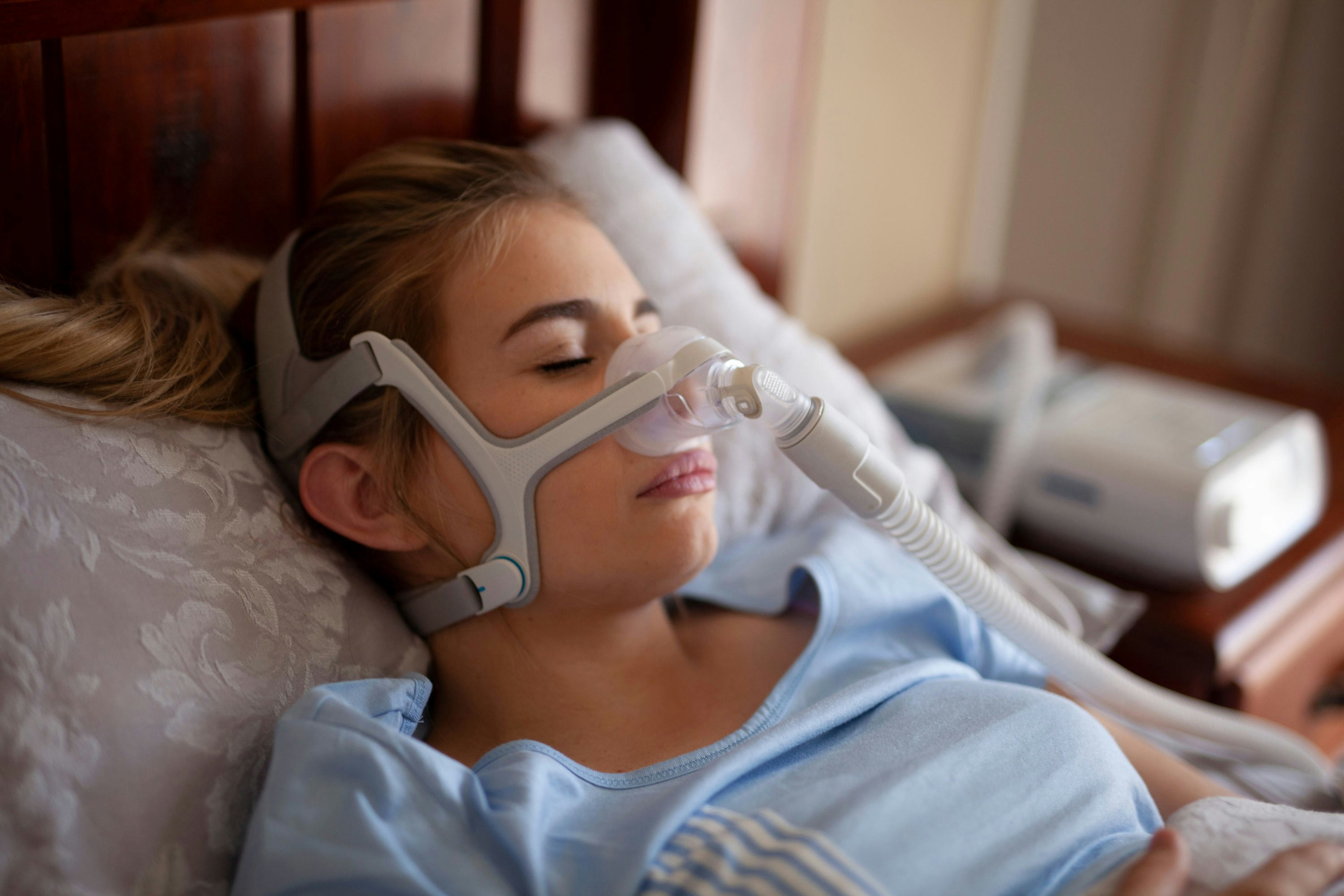 Woman with CPAP machine