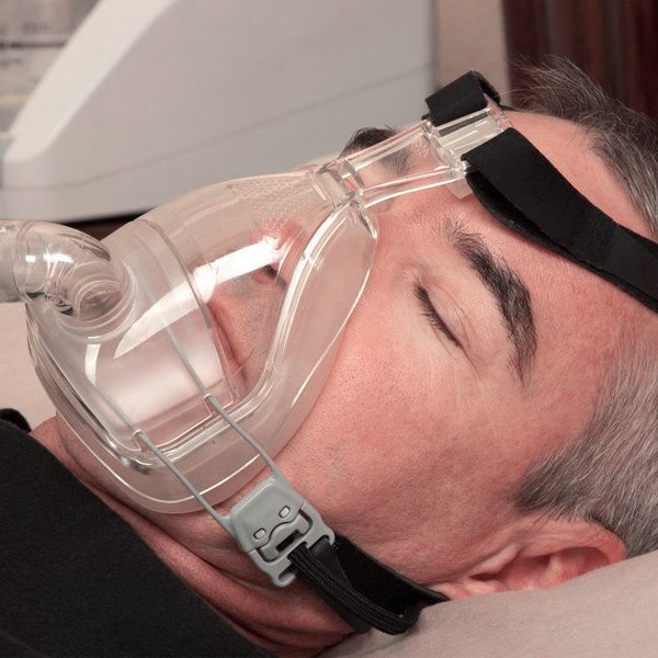 Man with CPAP machine