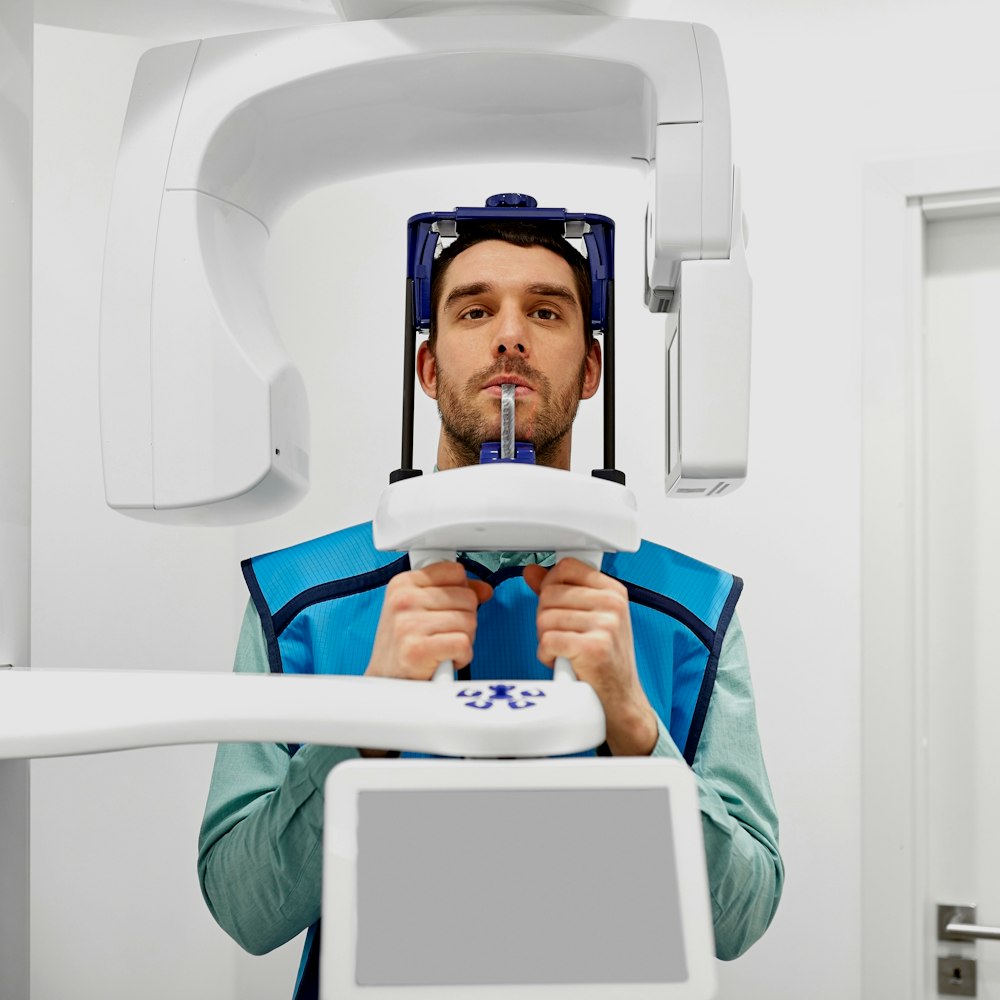 Man using CT scanner