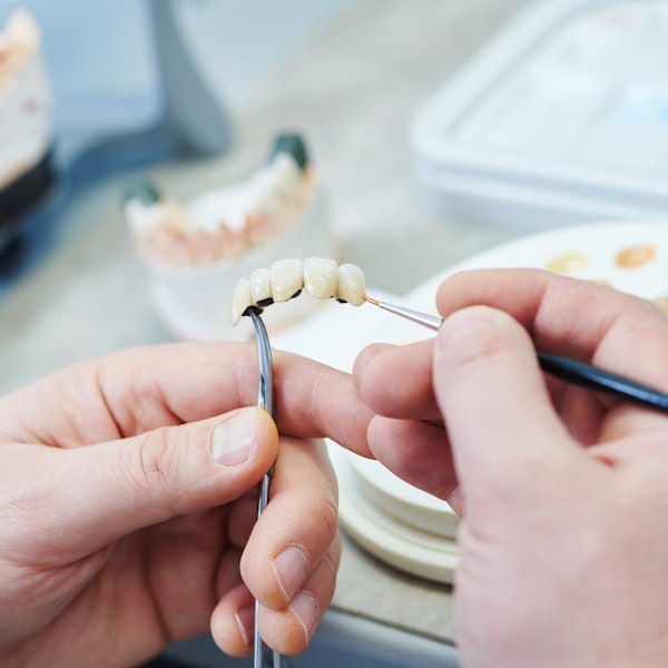 Doctor Working on Dental Bridge