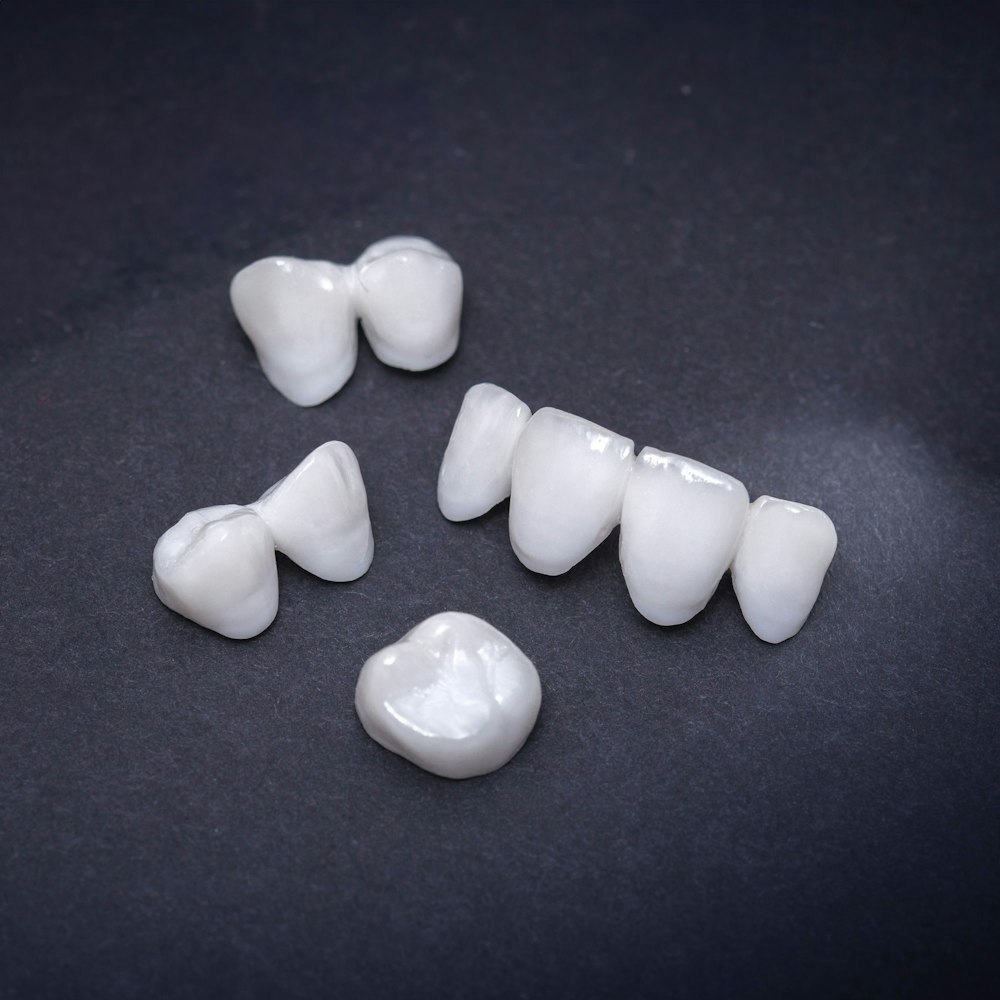 Dental crown and bridges against a dark background