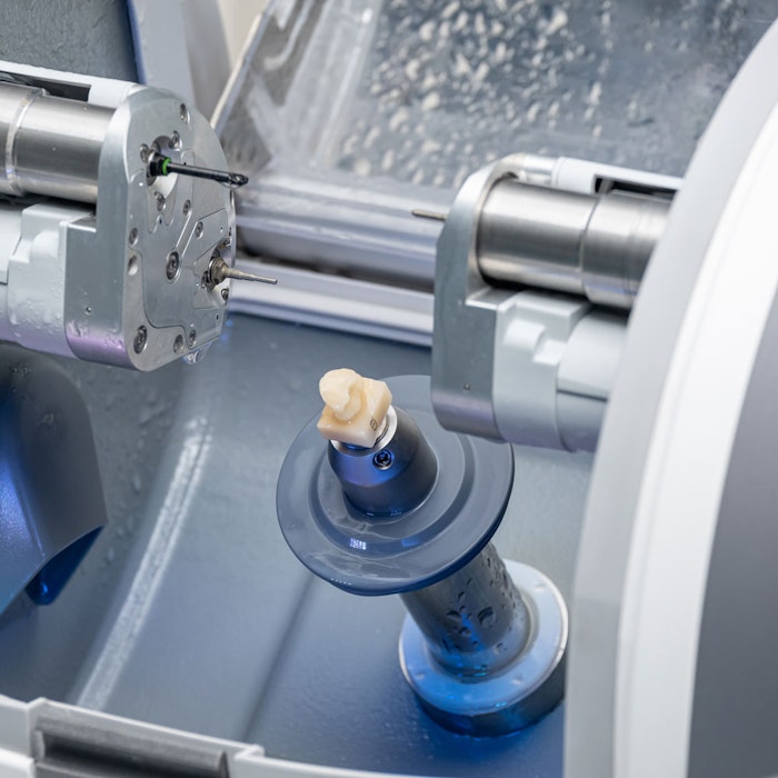 CEREC machine milling block of porcelain for a same-day crown