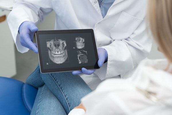 Woman receiving digital imaging on her teeth